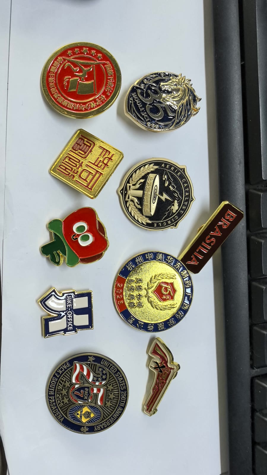 The range · 3D die-cast, printed, enamel, badges